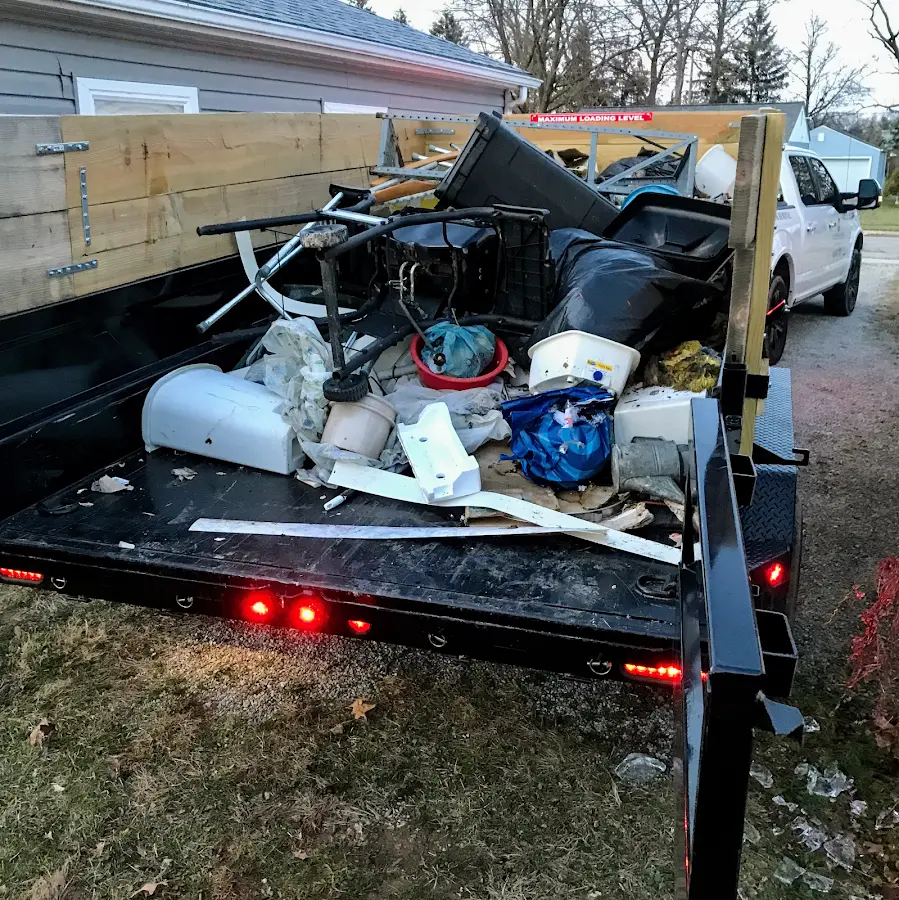 Roll-off dumpster delivered to a residential driveway in Forest Lake
